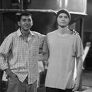 Honduran coffee producer and american roaster standing together