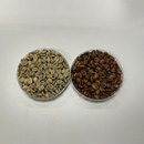 Two containers of Brazilian coffee beans, one green and one roasted, on a white background